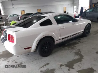 2007 Ford Mustang Deluxe with VIN 1ZVFT80N575259508, listed as a IAAI auction lot 41569259 with 164,315 mi miles. Bid and sale history available at carsss.com. Image 4.