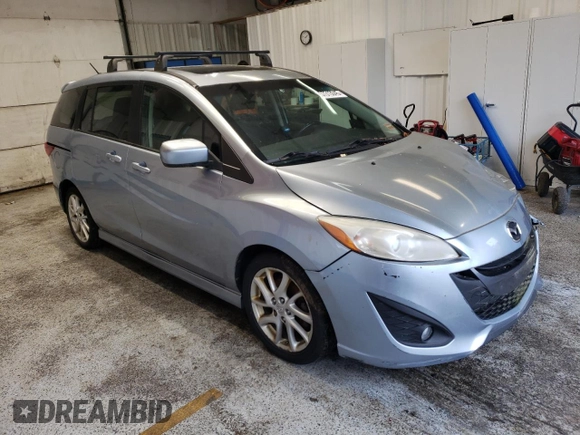 2012 Mazda 5 Touring z VIN JM1CW2CL6C0107720, wystawiony jako Copart lot #57313045 z przebiegiem 112 051 mil mil oraz Szkoda całkowita • Salvage title. Historia ofert i sprzedaży dostępna na DreamBid. Obrazek 4.