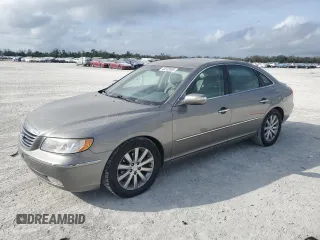 2009 Hyundai Azera Limited z VIN KMHFC46FX9A373084, wystawiony jako Copart lot #45532865 z przebiegiem 107 592 mil mil oraz Szkoda całkowita • Salvage title. Historia ofert i sprzedaży dostępna na DreamBid. Obrazek 1.