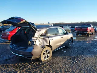2020 Acura MDX with VIN 5J8YD4H31LL007797, listed as a IAAI auction lot 41109200 with 70,470 mi miles. Bid and sale history available at carsss.com. Image 4.