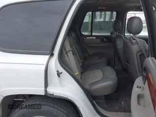 2003 GMC Envoy SLE with VIN 1GKDS13S532253648, listed as a IAAI auction lot 41850094 with 147,254 mi miles. Bid and sale history available at carsss.com. Image 8.