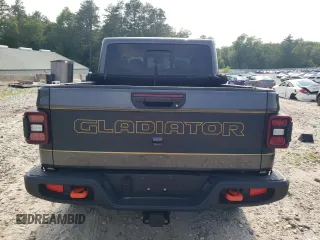 2021 Jeep Gladiator Mojave z VIN 1C6JJTEG8ML594082, wystawiony jako Copart lot #60830745 z przebiegiem 27 528 mil mil oraz Szkoda całkowita • Salvage title. Historia ofert i sprzedaży dostępna na DreamBid. Obrazek 6.