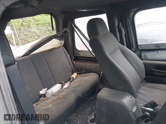 2006 Jeep Wrangler X with VIN 1J4FA39SX6P707937, listed as a IAAI auction lot 42128129 with 93,629 mi miles and . Bid and sale history available at DreamBid. Image 8.