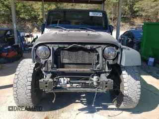 2016 Jeep Wrangler Unlimited Rubicon Hard Rock with VIN 1C4HJWFG7GL239318, listed as a Copart auction lot 76356734 with 121,442 mi miles and Salvage Title. Bid and sale history available at carsss.com. Image 5.