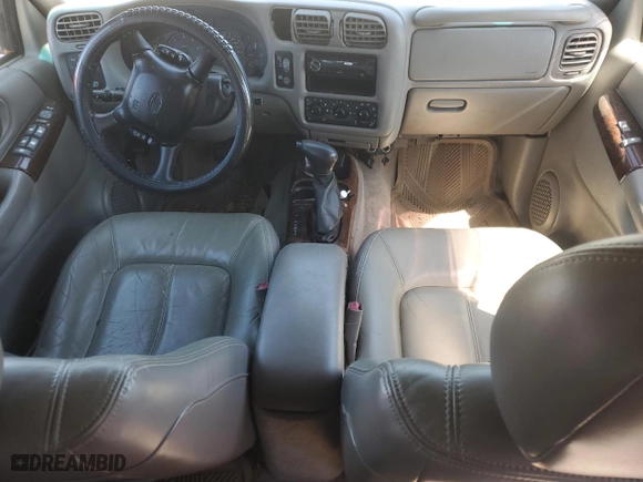 2001 Oldsmobile Bravada with VIN 1GHDT13W012174620, listed as a Copart auction lot 50523084 with NaN miles and Salvage Title. Bid and sale history available at carsss.com. Image 8.