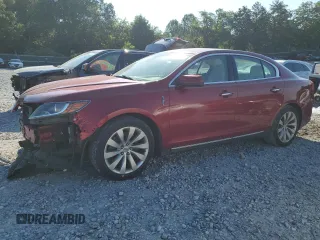 2013 Lincoln MKS with VIN 1LNHL9DKXDG600785, listed as a Copart auction lot 63059685 with 176,147 mi miles and Salvage title. Bid and sale history available at DreamBid. Image 1.