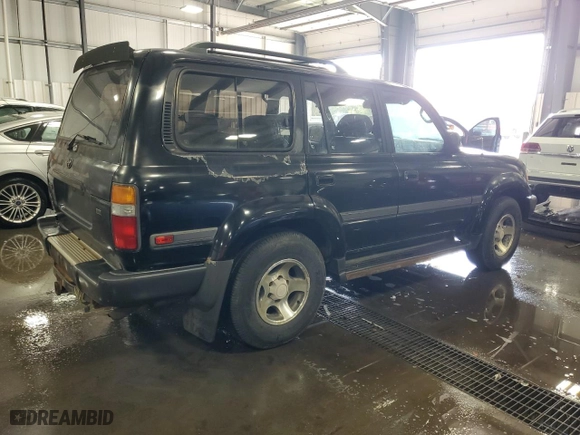 1997 Toyota Land Cruiser with VIN JT3HJ85J0V0184304, listed as a Copart auction lot 72438414 with 310,213 mi miles and Clean Title. Bid and sale history available at carsss.com. Image 3.