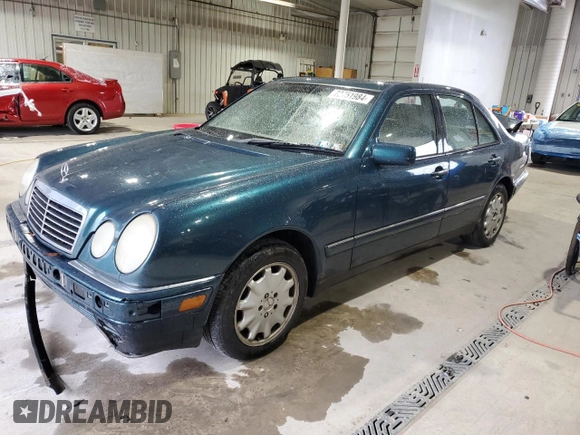 1998 Mercedes-Benz E-Class with VIN WDBJF65F6WA590094, listed as a Copart auction lot 72751984 with 196,048 mi miles and Salvage Title. Bid and sale history available at carsss.com. Image 1.