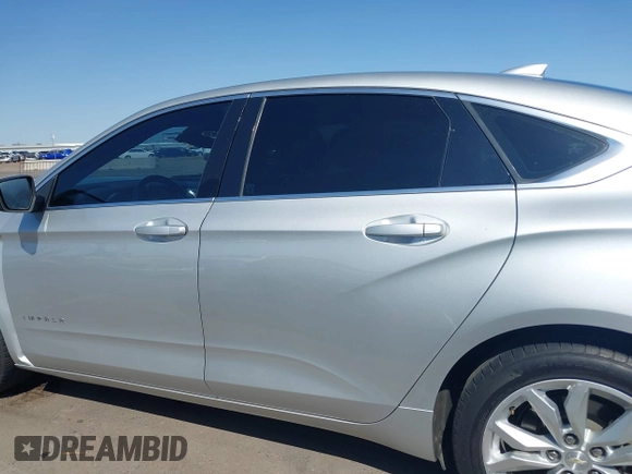 2017 Chevrolet Impala LT with VIN 2G1105S35H9158921, listed as a IAAI auction lot 41974553 with 138,955 mi miles and . Bid and sale history available at DreamBid. Image 15.