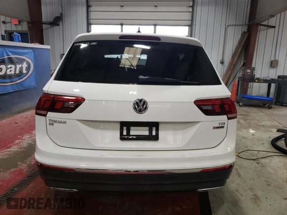 2018 Volkswagen Tiguan SEL with VIN 3VV2B7AX9JM065985, listed as a Copart auction lot 79404694 with Not provided miles and Salvage title. Bid and sale history available at DreamBid. Image 6.