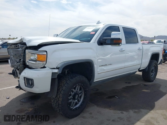 2016 GMC Sierra 2500HD Denali z VIN 1GT12UE88GF170375, wystawiony jako IAAI lot #41885873 z przebiegiem 150 108 mil mil oraz . Historia ofert i sprzedaży dostępna na DreamBid. Obrazek 17.