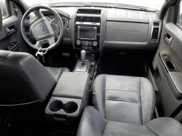 2010 Ford Escape Limited с VIN 1FMCU0EG8AKD06419, выставлен на аукционе Copart как лот 62357115 с пробегом 138 687 миль миль и Списание • Salvage title. История ставок и продаж доступна на DreamBid. Изображение 8.