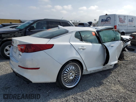 2014 Kia Optima SX with VIN 5XXGR4A77EG310630, listed as a Copart auction lot 57258405 with 100,191 mi miles and Salvage title. Bid and sale history available at DreamBid. Image 3.