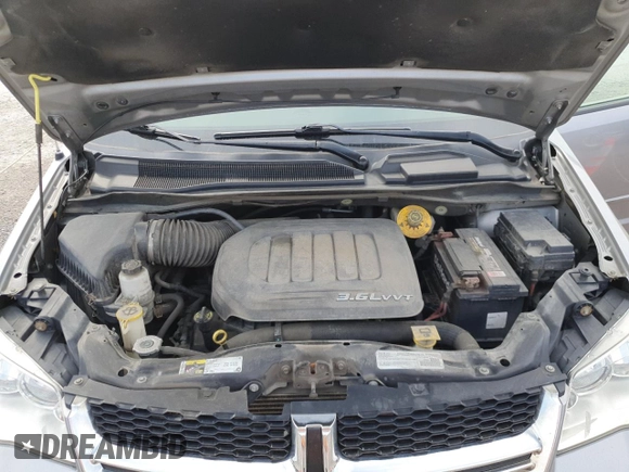 2017 Dodge Grand Caravan SE Plus with VIN 2C4RDGBG0HR830686, listed as a Copart auction lot 53799585 with 191,054 mi miles and Salvage Title. Bid and sale history available at DreamBid. Image 12.