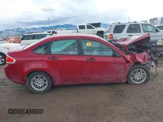 2009 Ford Focus SE z VIN 1FAHP35N39W205218, wystawiony jako IAAI lot #41788041 z przebiegiem Nie podano mil oraz . Historia ofert i sprzedaży dostępna na DreamBid. Obrazek 13.