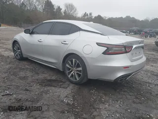 2019 Nissan Maxima Platinum z VIN 1N4AA6AV6KC372254, wystawiony jako IAAI lot #41519515 z przebiegiem 124 326 mil mil oraz . Historia ofert i sprzedaży dostępna na DreamBid. Obrazek 3.
