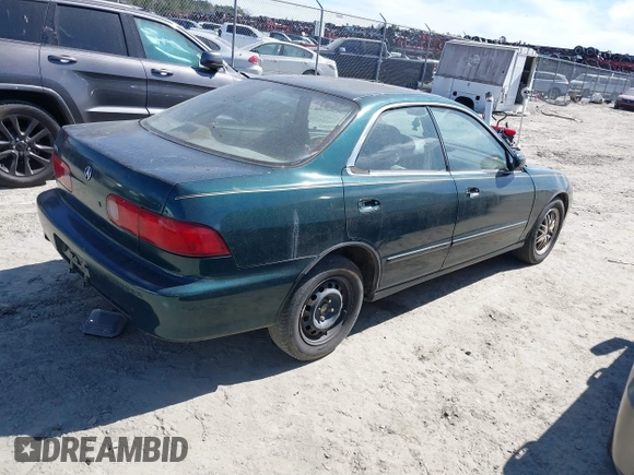 1999 Acura Integra LS with VIN JH4DB7658XS002311, listed as a IAAI auction lot 41697843 with 235,682 mi miles and . Bid and sale history available at DreamBid. Image 4.