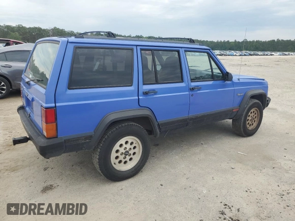 1996 Jeep Cherokee Sport z VIN 1J4FT68S8TL128381, wystawiony jako Copart lot #57496175 z przebiegiem 221 330 mil mil oraz Szkoda całkowita • Salvage title. Historia ofert i sprzedaży dostępna na DreamBid. Obrazek 3.