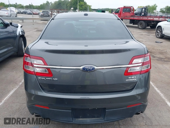 2015 Ford Taurus SEL with VIN 1FAHP2E81FG163058, listed as a IAAI auction lot 42221098 with 127,957 mi miles and . Bid and sale history available at carsss.com. Image 16.