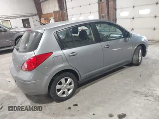 2009 Nissan Versa 1.8 SL with VIN 3N1BC13E99L409551, listed as a IAAI auction lot 41628375 with 214,873 mi miles. Bid and sale history available at carsss.com. Image 4.