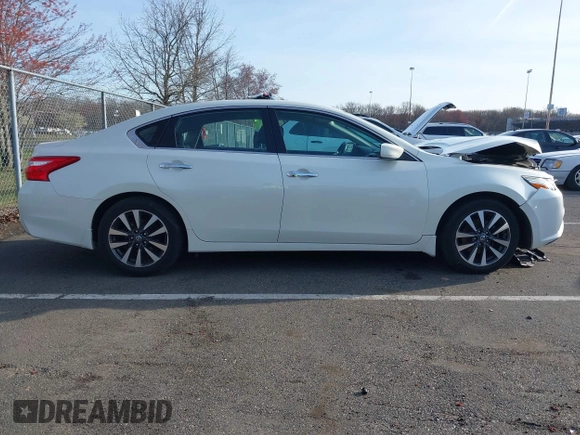 2017 Nissan Altima SV with VIN 1N4AL3AP1HC225309, listed as a IAAI auction lot 41943323 with 105,191 mi miles and . Bid and sale history available at DreamBid. Image 13.