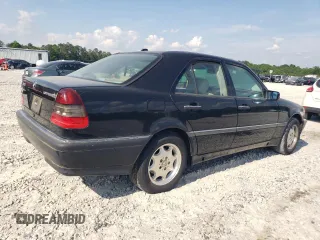 2000 Mercedes-Benz C 230 Kompressor with VIN WDBHA24G4YA839138, listed as a Copart auction lot 54525245 with 227,775 mi miles and Salvage title. Bid and sale history available at DreamBid. Image 3.