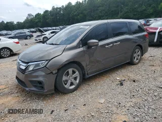 2018 Honda Odyssey EX-L z VIN 5FNRL6H73JB030485, wystawiony jako Copart lot #57485585 z przebiegiem 99 012 mil mil oraz Szkoda całkowita • Salvage title. Historia ofert i sprzedaży dostępna na DreamBid. Obrazek 1.