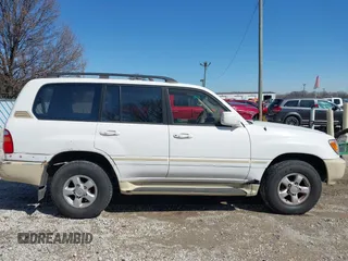 2000 Toyota Land Cruiser z VIN JT3HT05J5Y0126396, wystawiony jako IAAI lot #41986185 z przebiegiem 201 156 mil mil oraz . Historia ofert i sprzedaży dostępna na DreamBid. Obrazek 14.
