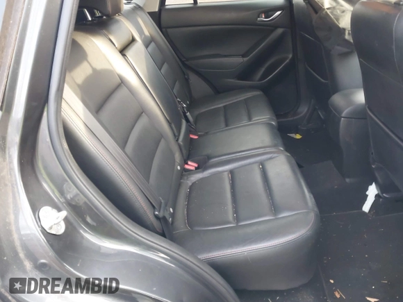 2015 Mazda CX-5 Grand Touring with VIN JM3KE4DY5F0470445, listed as a IAAI auction lot 41236468 with 87,845 mi miles. Bid and sale history available at carsss.com. Image 8.