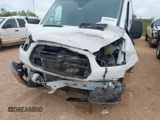 2019 Ford Transit Cargo with VIN 1FTBW3XM8KKA93794, listed as a IAAI auction lot 39696255 with 127,396 mi miles and . Bid and sale history available at DreamBid. Image 6.