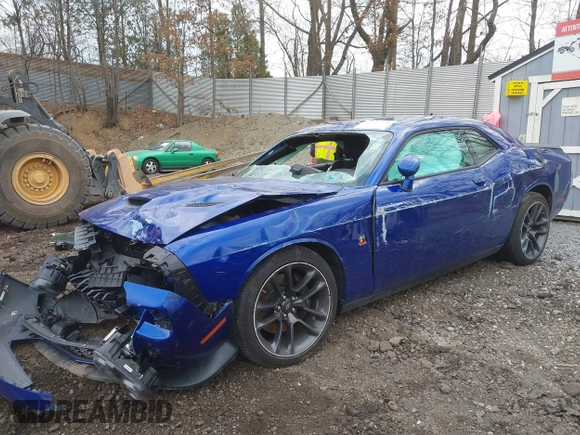2021 Dodge Challenger R/T Scat Pack Widebody z VIN 2C3CDZFJXMH615361, wystawiony jako IAAI lot #41911374 z przebiegiem 27 159 mil mil oraz . Historia ofert i sprzedaży dostępna na DreamBid. Obrazek 2.