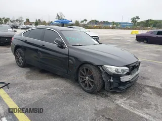 2016 BMW 4 Series 428i xDrive with VIN WBA4C9C58GG136248, listed as a IAAI auction lot 41346270 with 129,464 mi miles and . Bid and sale history available at carsss.com. Image 1.