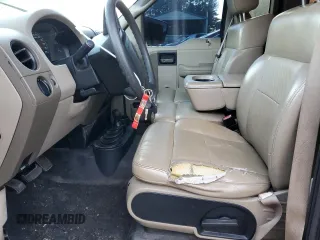 2004 Ford F-150 XL with VIN 1FTRF14W54NB47286, listed as a Copart auction lot 83533324 with 302,443 mi miles and Salvage Title. Bid and sale history available at DreamBid. Image 7.