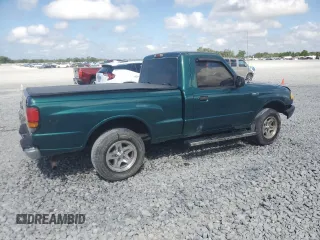 1999 Mazda B-Series Truck SX z VIN 4F4YR12CXXTM34917, wystawiony jako Copart lot #50821635 z przebiegiem 121 165 mil mil oraz Szkoda całkowita • Salvage title. Historia ofert i sprzedaży dostępna na DreamBid. Obrazek 3.