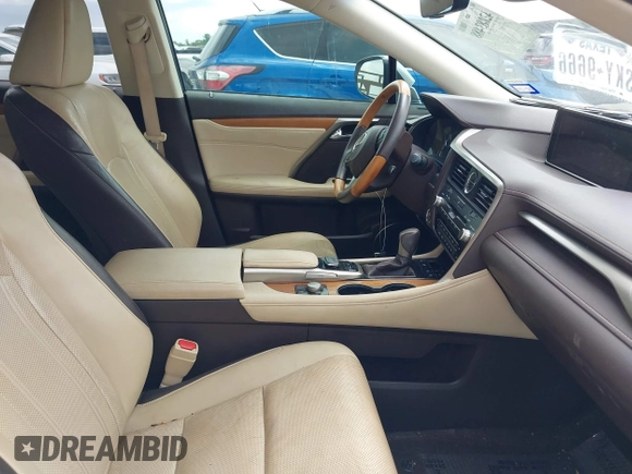 2016 Lexus RX 350 z VIN 2T2ZZMCAXGC001550, wystawiony jako IAAI lot #42083488 z przebiegiem 93 377 mil mil oraz . Historia ofert i sprzedaży dostępna na DreamBid. Obrazek 5.