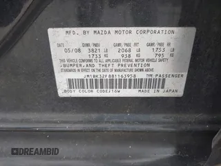 2008 Mazda 3 i Sport with VIN JM1BK32F881163958, listed as a IAAI auction lot 42088111 with 160,585 mi miles and . Bid and sale history available at DreamBid. Image 9.