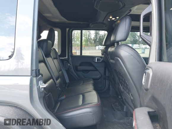 2021 Jeep Wrangler Unlimited Rubicon with VIN 1C4HJXFG9MW531858, listed as a IAAI auction lot 42001095 with 38,240 mi miles and . Bid and sale history available at DreamBid. Image 8.