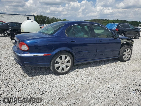 2004 Jaguar X-Type with VIN SAJEA51C44WD83361, listed as a Copart auction lot 55643545 with 54,615 mi miles and Salvage Title. Bid and sale history available at DreamBid. Image 3.