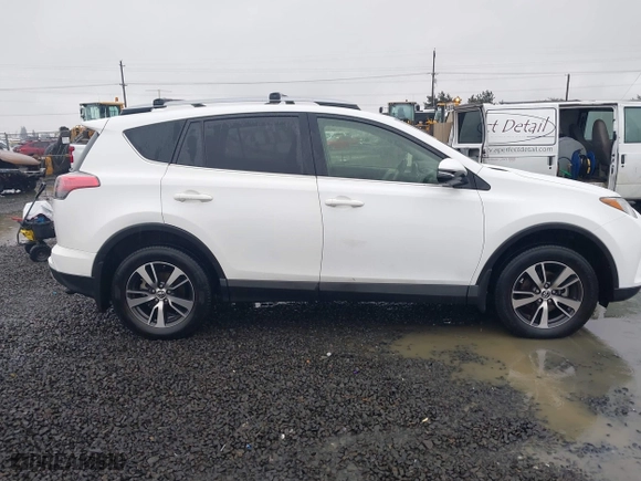 2017 Toyota RAV4 XLE with VIN JTMRFREV2HD212188, listed as a IAAI auction lot 41216790 with 79,594 mi miles. Bid and sale history available at carsss.com. Image 14.
