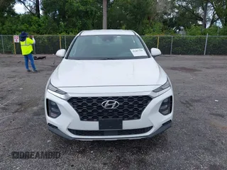 2019 Hyundai Santa Fe SE with VIN 5NMS23ADXKH038506, listed as a IAAI auction lot 42407399 with 54,540 mi miles and . Bid and sale history available at DreamBid. Image 13.