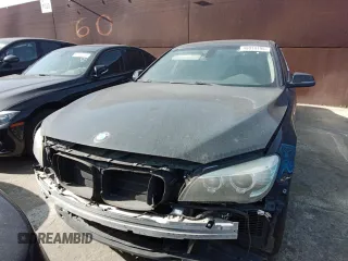 2015 BMW 7 Series 740Li with VIN WBAYE4C52FD946831, listed as a Copart auction lot 49014195 with 137,447 mi miles and Salvage Title. Bid and sale history available at DreamBid. Image 5.