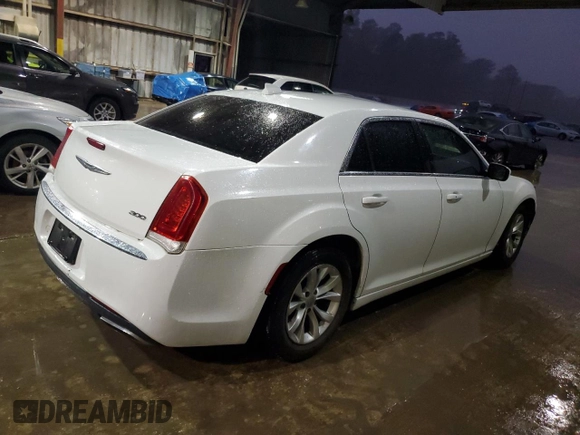 2015 Chrysler 300 Limited with VIN 2C3CCAAG5FH820184, listed as a Copart auction lot 84105134 with 210,459 mi miles and Salvage Title. Bid and sale history available at carsss.com. Image 3.
