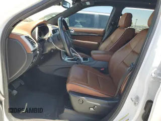 2018 Jeep Grand Cherokee Summit with VIN 1C4RJEJG9JC212554, listed as a Copart auction lot 63123065 with 82,976 mi miles and Salvage title. Bid and sale history available at DreamBid. Image 7.
