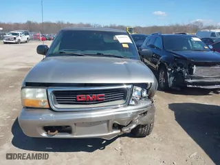 2003 GMC Sonoma SLS with VIN 1GTDT19X038247958, listed as a IAAI auction lot 42005992 with 134,857 mi miles. Bid and sale history available at carsss.com. Image 12.
