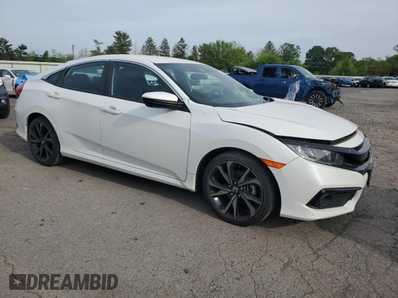2019 Honda Civic Sport with VIN 2HGFC2F89KH594162, listed as a Copart auction lot 56005095 with 32,870 mi miles and Salvage title. Bid and sale history available at DreamBid. Image 4.