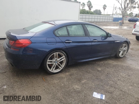 2015 BMW 6 Series 640i with VIN WBA6A0C59FGB53667, listed as a Copart auction lot 74034834 with Not Provided miles and Salvage Title. Bid and sale history available at DreamBid. Image 3.