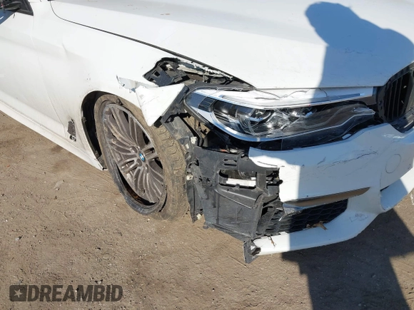 2018 BMW 5 Series M550i xDrive with VIN WBAJB9C53JB036097, listed as a IAAI auction lot 41743031 with 70,164 mi miles and . Bid and sale history available at carsss.com. Image 6.