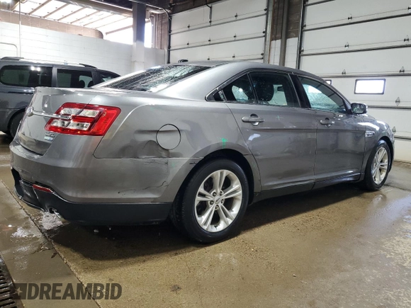 2013 Ford Taurus SEL z VIN 1FAHP2H84DG110704, wystawiony jako Copart lot #53538535 z przebiegiem 129 826 mil mil oraz Szkoda całkowita • Salvage title. Historia ofert i sprzedaży dostępna na DreamBid. Obrazek 3.