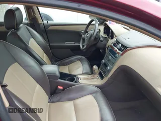 2009 Chevrolet Malibu LTZ with VIN 1G1ZK57709F154602, listed as a IAAI auction lot 41739194 with 132,597 mi miles and . Bid and sale history available at DreamBid. Image 5.