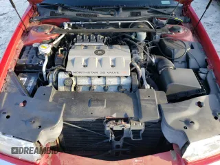 1998 Cadillac Eldorado z VIN 1G6EL12Y4WU610896, wystawiony jako Copart lot #74662244 z przebiegiem Nie podano mil oraz Szkody całkowita. Historia ofert i sprzedaży dostępna na DreamBid. Obrazek 11.